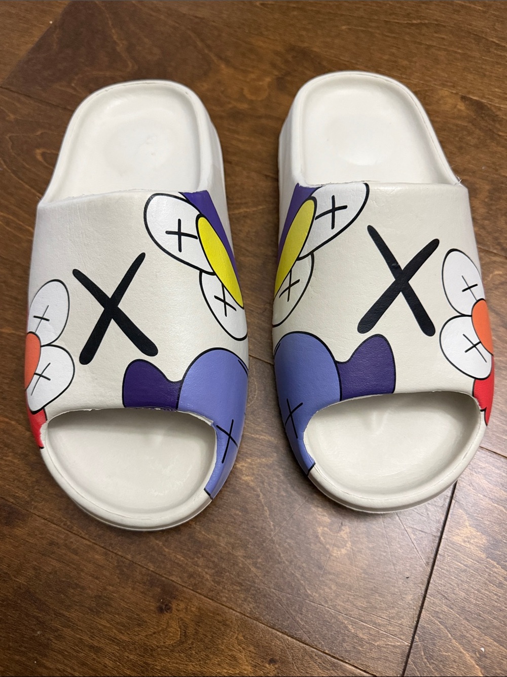 Cream Slide Sandals with KAWS Graphics